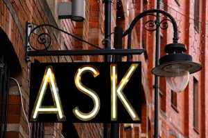 Neon sign that says ASK