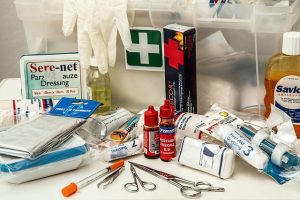 contents of a first aid kit displayed on a table
