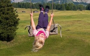 young girl on a swing