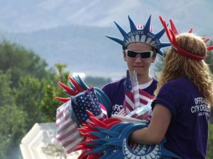 Man selling flags and Liberty crowns