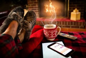 relaxing by a fireplace