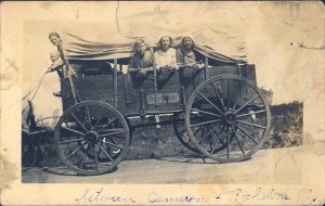 old wagon with people in it